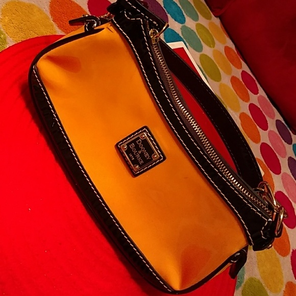 Dooney & Bourke Handbags - Authentic Dooney & Burke small yellow bag.